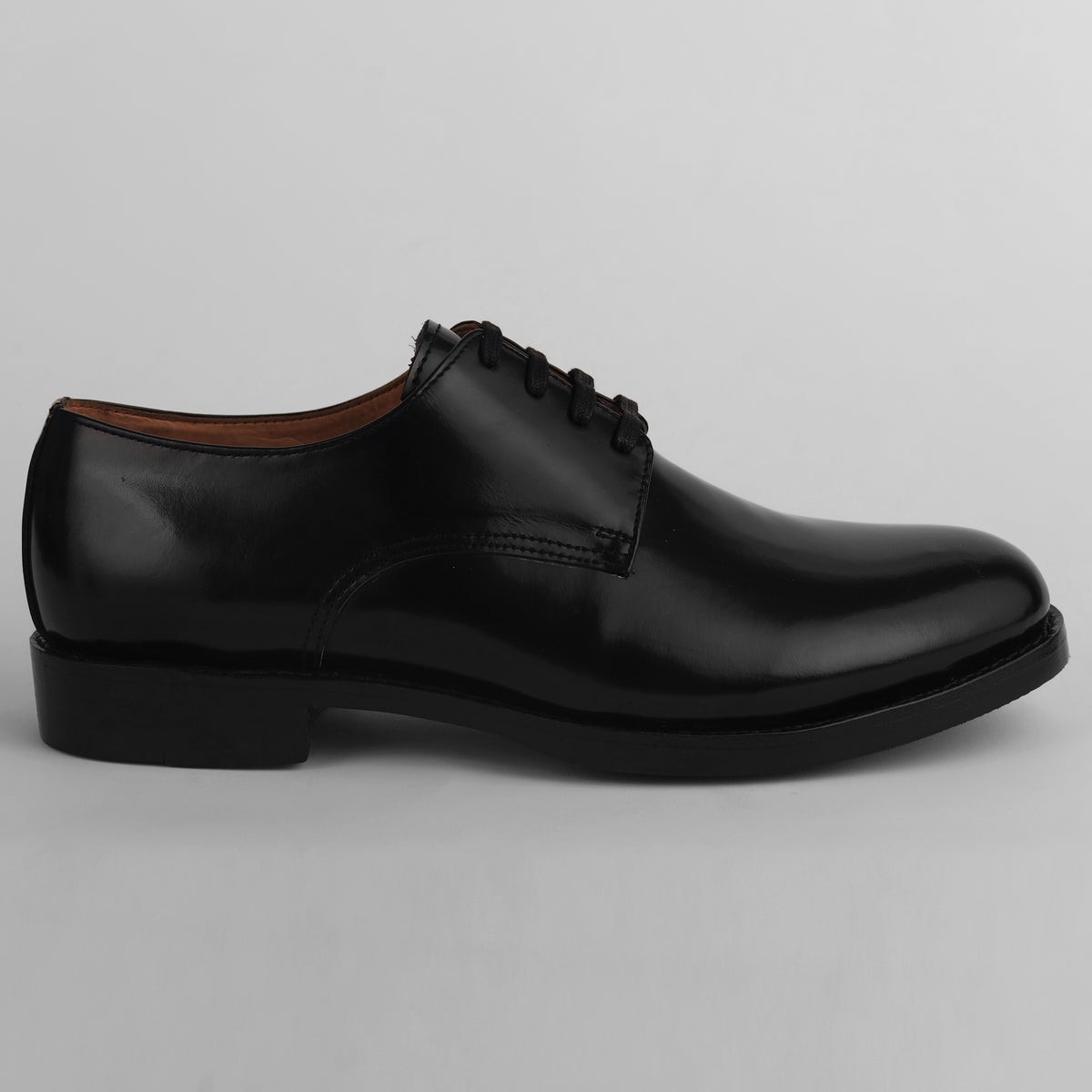 Side view of black Blucher Goodyear welted leather shoe