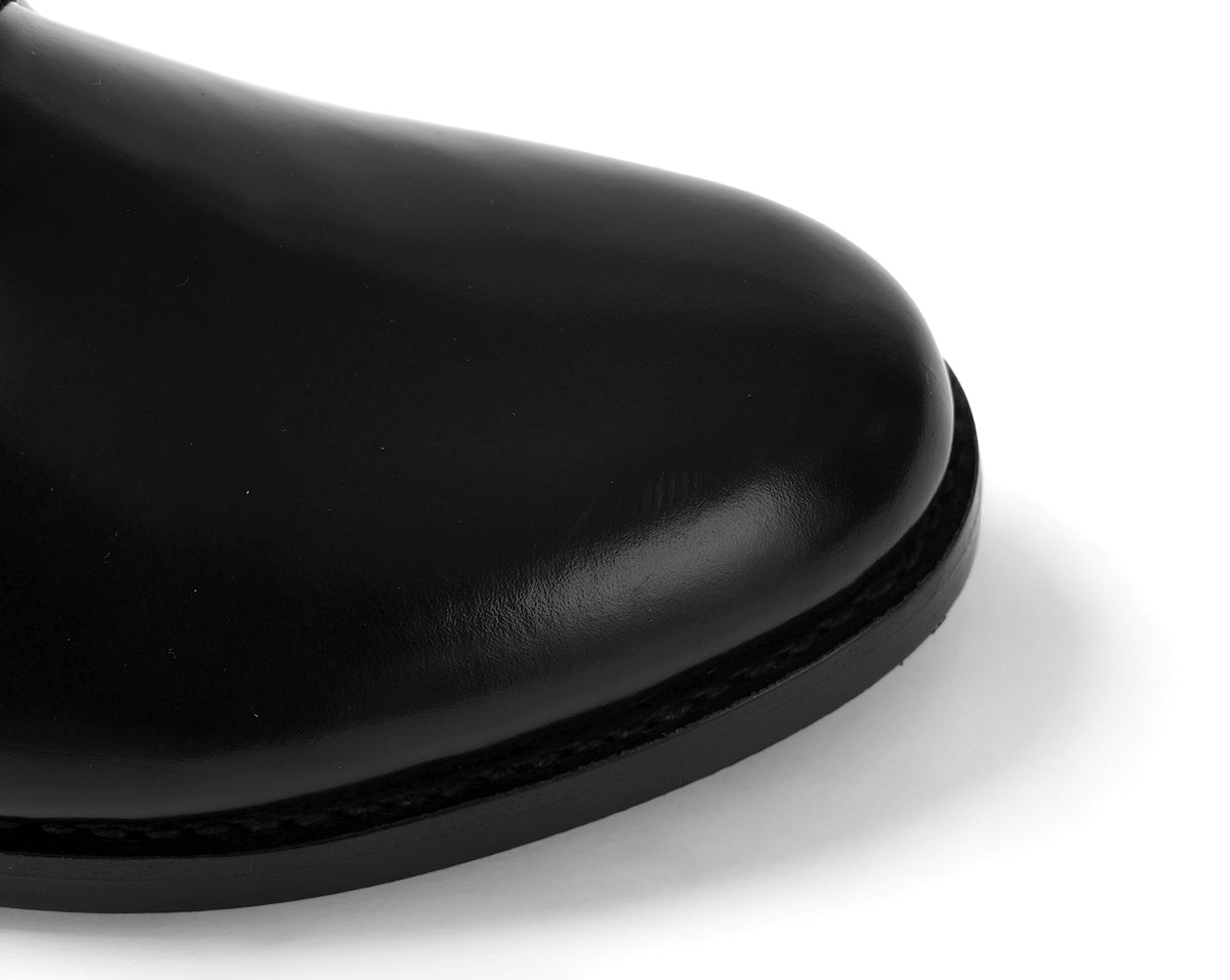 Close-up of black Goodyear welted Blucher shoe highlighting premium leather upper