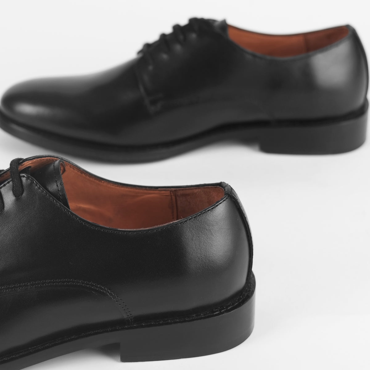 Side view of Blucher Classic Executive black leather Blucher shoe showing heel profile