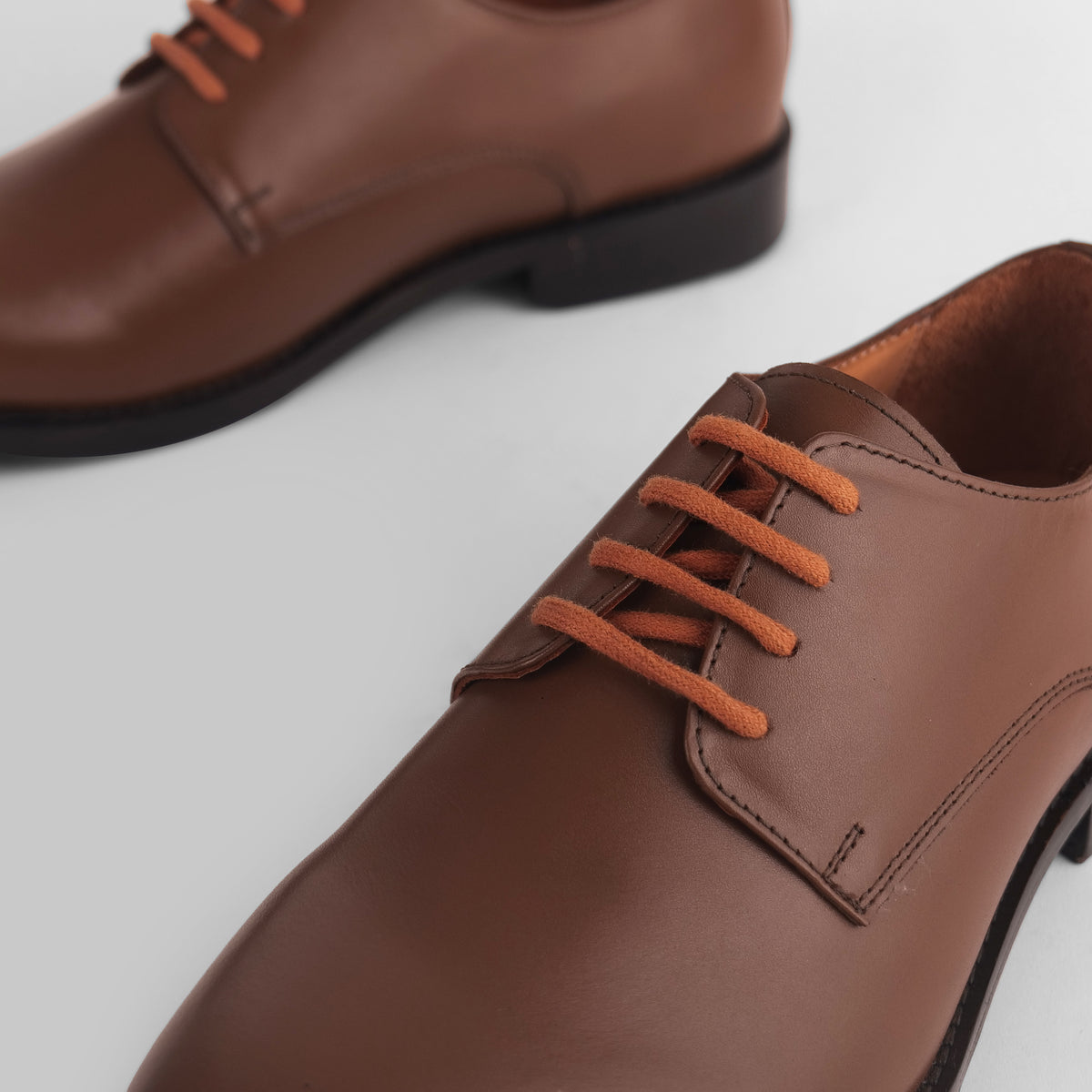 Close-up of Blucher Classic Executive brown leather Blucher shoe with lace detail