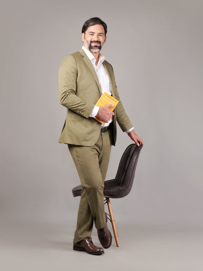 Blucher Classic Executive brown leather Blucher shoes worn by male model holding a book