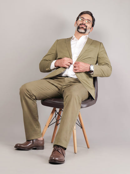 Blucher Classic Executive brown leather Blucher shoes worn by male model sitting on a chair