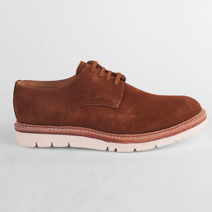Side profile of a brown Blucher Suede shoe showing overall design