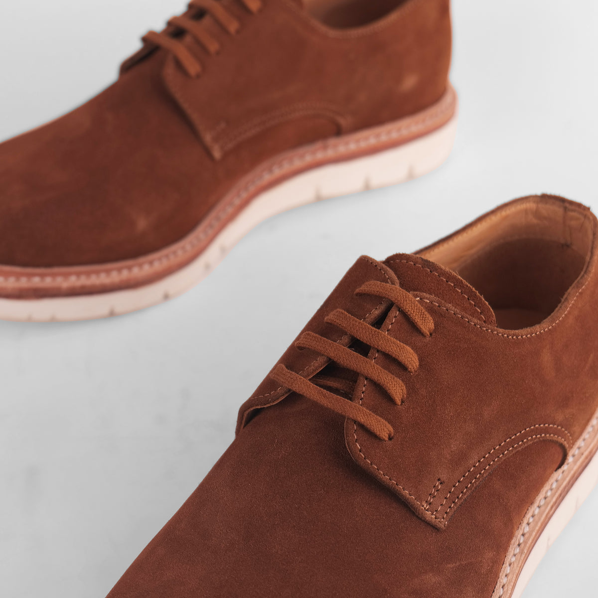 Close-up of brown Blucher Suede shoe highlighting lace detail