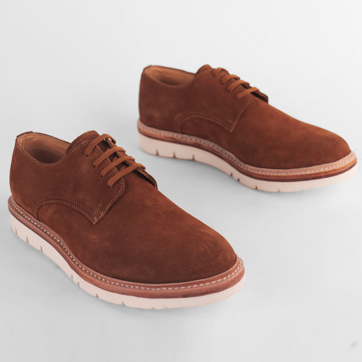 Top view of a pair of brown Blucher Suede shoes