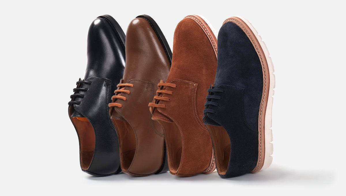 Four styles of handmade leather Blucher shoes displayed in a row